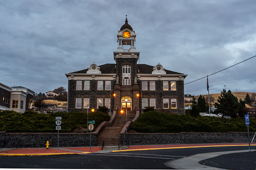 Heppner, Oregon, USA - November 25th, 2022: Historical Morrow County courthouse in twilight. it was listed on the National Register of Historic Places
