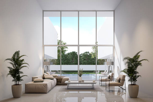 istock Minimal style modern white living room with swimming pool terrace 3d render 1450242222