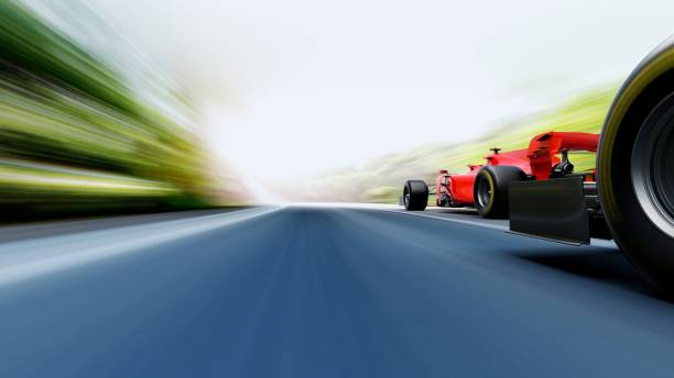 istock red race car leading on a race track 1450248159