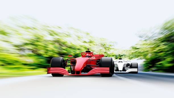 istock red race car leading on a race track 1450248160