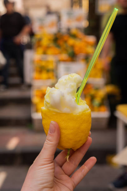 Amalfi lemon sorbet in a large lemon. National Italian dessert - ice cream. Amalfi lemon sorbet in a large lemon. National Italian dessert - ice cream. A walk through the narrow Italian streets. amalfi food stock pictures, royalty-free photos & images
