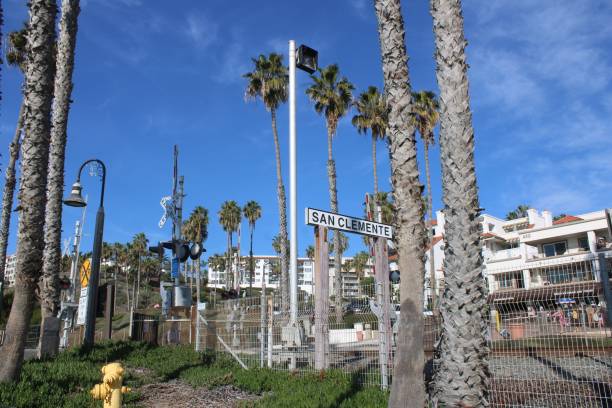 San Clemente Beach San Clemente, CA, USA-December 4, 2022: Main railroad crossing intersecting resort hotels and San Clemente State Beach san clemente california stock pictures, royalty-free photos & images