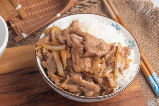 istock Grilled pork with Japanese sauce and onions 1450252613