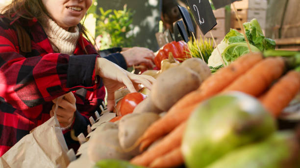 istock Young client looking at organic eco products to buy 1450259161
