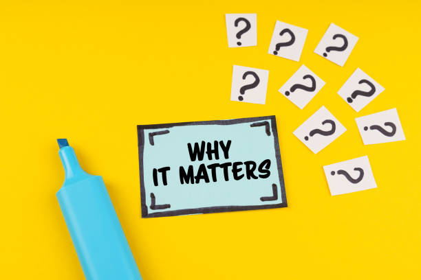 istock On the yellow surface is a marker, question marks and a sticker with the inscription - Why It Matters 1450260564