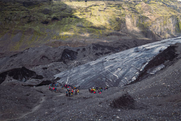 istock Tourist group on mountain slope landscape photo 1450260962