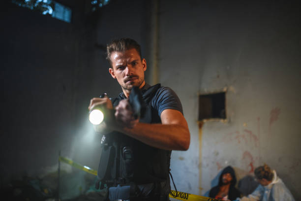 istock Serious White Male Detective Pointing With A Fire Gun 1450263450