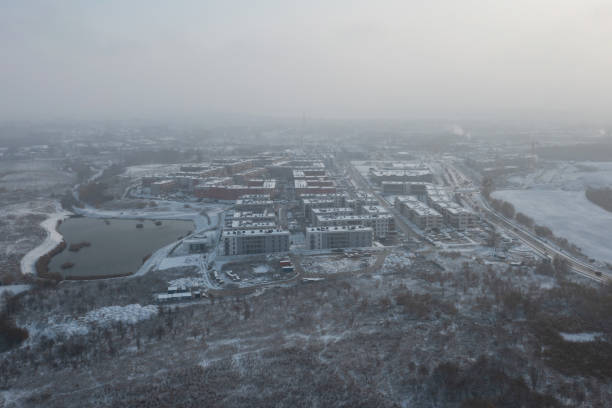 aerial landscape of pruszcz gdanski covered with fresh snow. poland - pomorskie province imagens e fotografias de stock