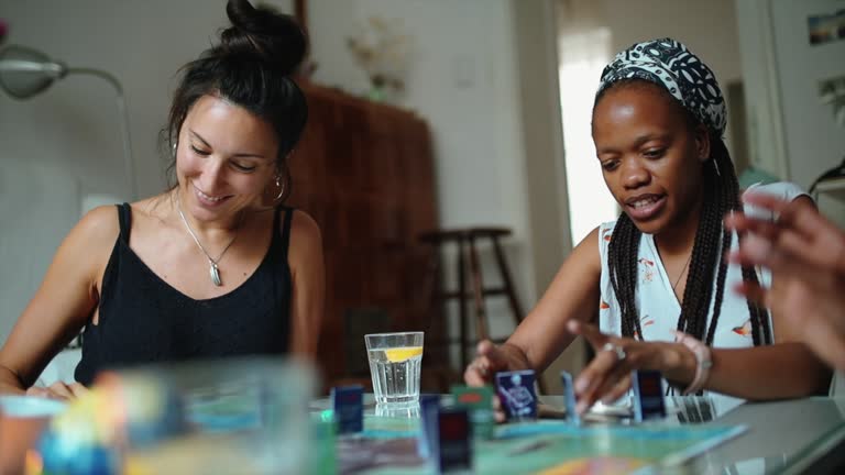 friends enjoying a role playing boardgame