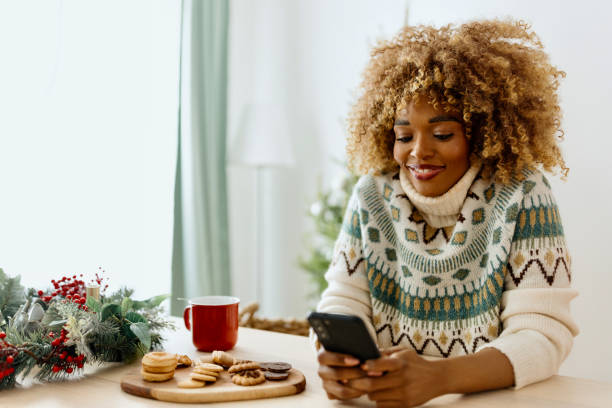 istock Woman texting at home 1450268923