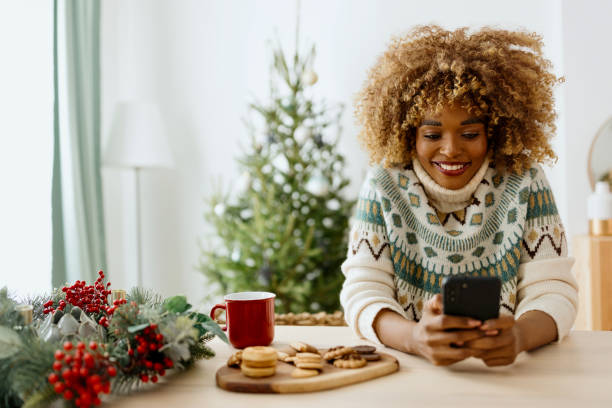 istock Woman texting at home 1450269021