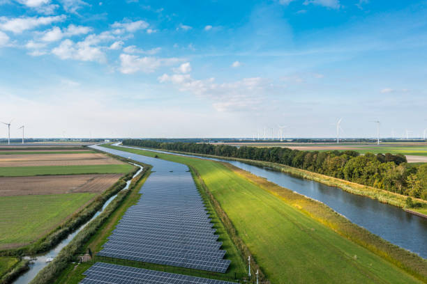 istock Wind, sun and water energy. 1450272079