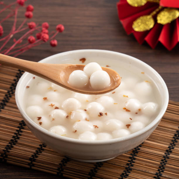 Little white tangyuan with sweet osmanthus honey and syrup soup.