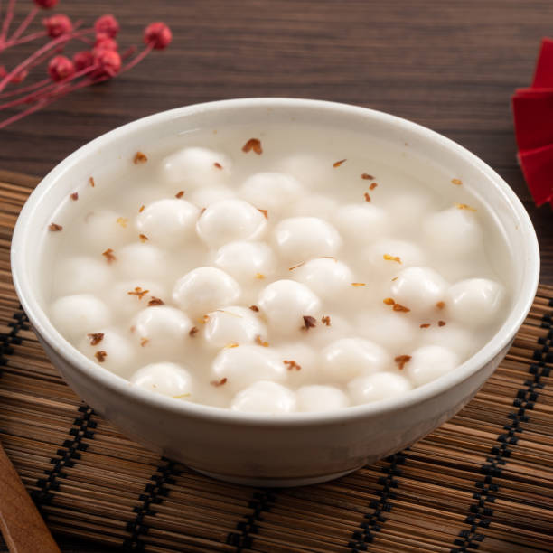 Little white tangyuan with sweet osmanthus honey and syrup soup.