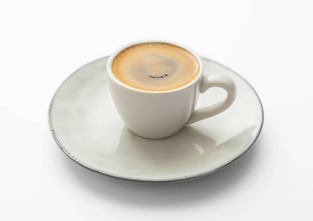 istock Espresso small fresh coffee cup on white background. Great source of energy 1450277164