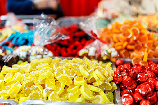 these peach candies are in a pile