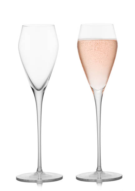 istock Prosecco wine and pink rose champagne empty and full glasses on white background. 1450279920