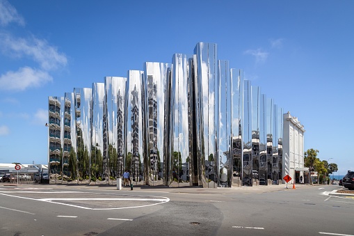 New Plymouth, New Zealand – November 19, 2019: Reflective stainless steel facade of the Len Lye Centre (Govett-Brewster Art Gallery) in New Plymouth, New Zealand.