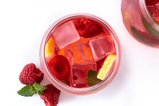 Raspberry lemonade drink isolated on white background