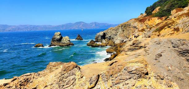 istock Sunny rocky coast of a sea 1450283667