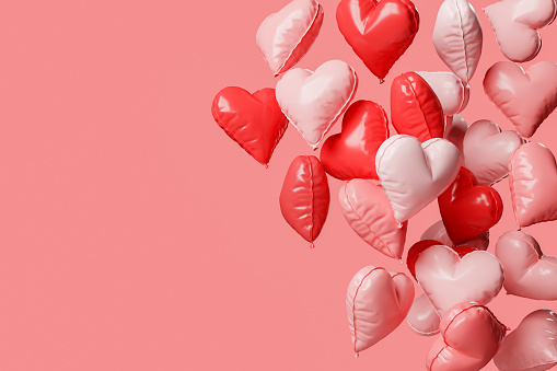 valentine's day background with floating inflatable heart balloons and space for text. concept of love and festivity. 3d rendering