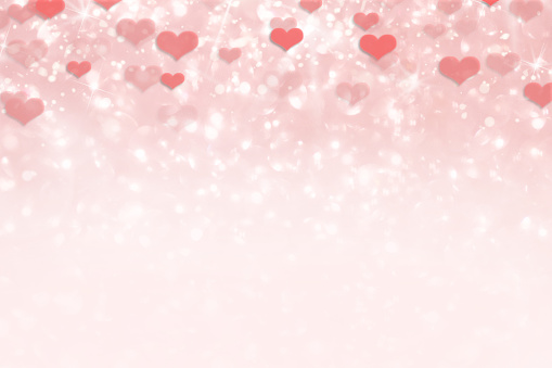 Pink shiny glittery heart background for Valentine's Day