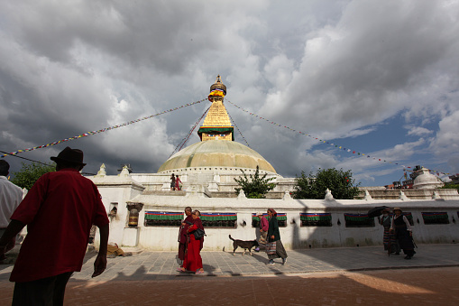 September 2, 2011 Kathmandu, Nepal.\nThe influx of large populations of refugees from Tibet has seen the construction of over 50 gompas (Tibetan monastery) around Boudha. As of 1979, Boudha Stupa is a UNESCO World Heritage Site. Along with Swayambhu, it is one of the most popular tourist sites in the Kathmandu area.