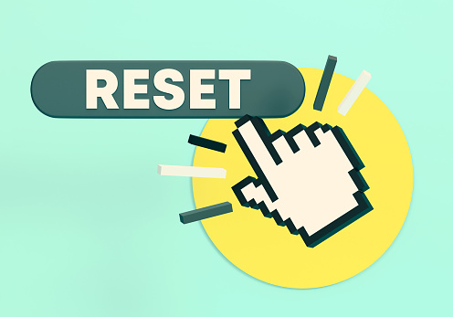 Reset Push Button And Cursor Hand On Blue Background