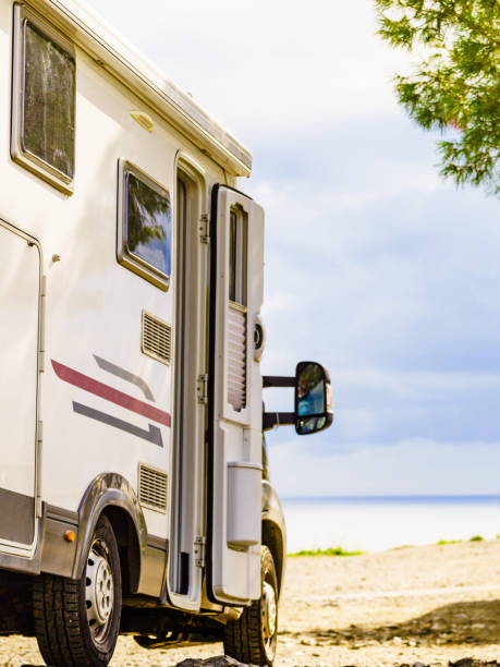 istock Rv motor home camping on beach 1450292436
