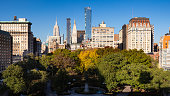 Union Square Park with surrounding skyscrapers in autumn. Manhattan, New York City