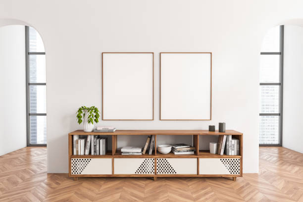 istock Stylish exhibition interior with drawer, panoramic window and mockup frames 1450294038