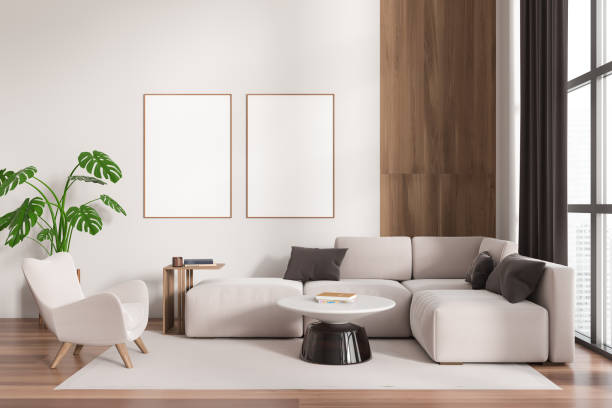 istock Light relaxing interior with couch and coffee table with decor, mockup frame 1450295057