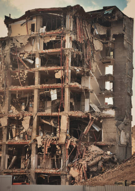 istock Old building being demolished to make room for new architecture. Construction Demolition Site. 1450296918