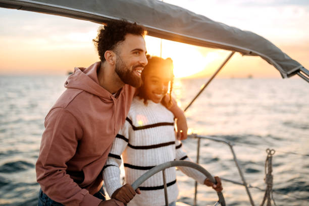 istock Father and daughter sailing together 1450298309