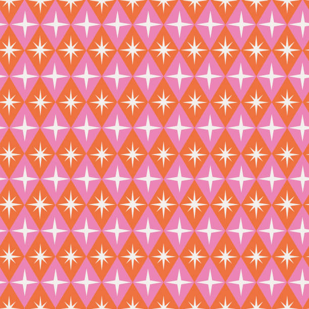 Mid century modern atomic starbursts seamless pattern on orange and pink retro diamond shapes. for home décor, wallpaper and textile