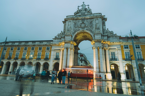 Praça do Comércio Square with Rua Augusta Arch during rain Lisbon Portugal.