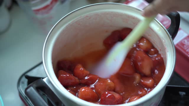 Stirring Strawberries For Jam