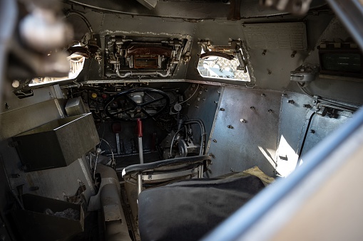 Los Angeles, United States – August 17, 2022: Light military armored vehicle, it is a Daimler Motor Company Ferret Scout, cockpit interior view