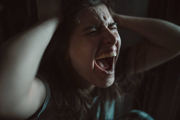 istock Woman screaming for having a mental breakdown. 1450308628
