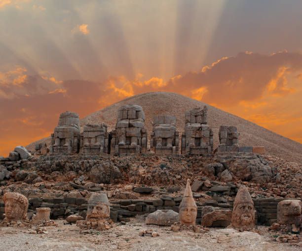 Head Statue at Nemrud Dagh at sunrise Head Statue at Nemrud Dagh at sunrise nemrut dagi stock pictures, royalty-free photos & images