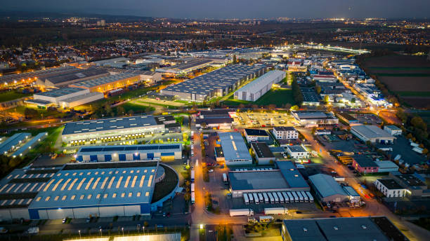 istock Industrial district at dusk - aerial view 1450311458