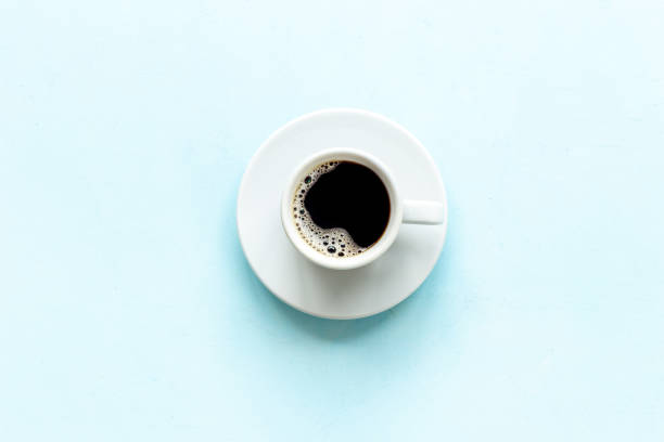 istock Black coffee - espresso - in white cup. Morning routine concept 1450312873