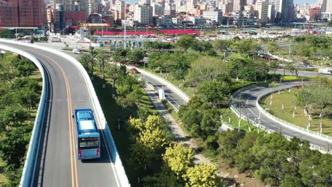 Eco-friendly cars drive on elevated roads