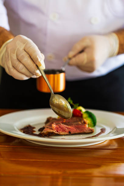 istock Beef steak and human hands,Be sure to have them ready in the restaurant. 1450314801