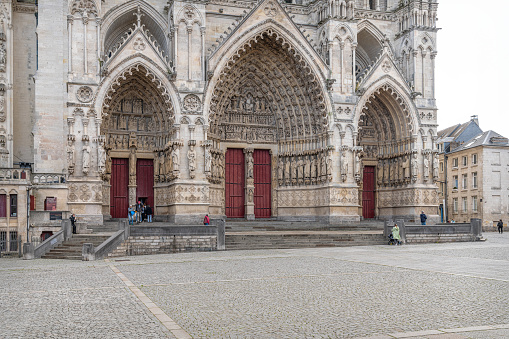 The west portal front entrance of the Cathedral Basilica of Our Lady, Amiens, France