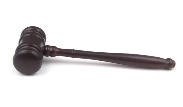 istock Judge's gavel isolated on white 1450322328