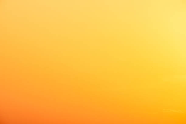 istock beautiful gradient orange clouds and sunlight on the blue sky perfect for the background, take in everning,Twilight 1450324390