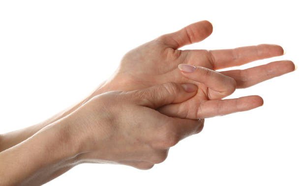 istock Woman with trigger finger condition on white background, closeup 1450324764