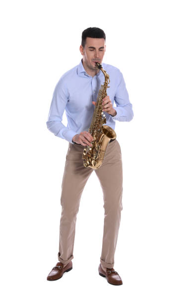 istock Young man playing saxophone on white background 1450326554