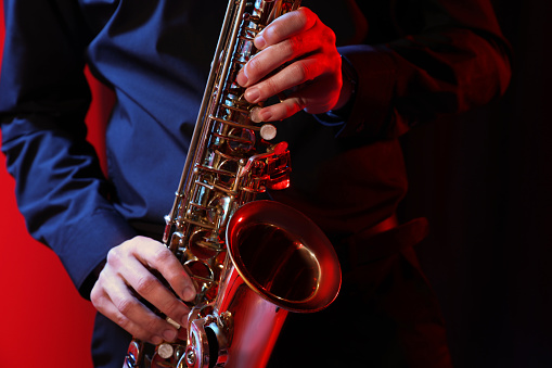Young man playing saxophone